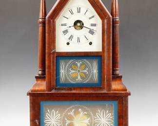 Lot 180:  A late 19th century Chauncey Jerome Sharp Gothic Steeple on Steeple shelf clock.  8-day double fusee time and strike movement marked "Chauncey Jerome, New Haven, Conn., USA" with a painted metal dial and Roman numerals.  Mahogany case with shaped upper door with clear dial glass and reverse painted lower flanked by double turned Candlesticks, above a lower door with reverse painted glass.  Paper label 10% intact.  Old finish with some wear, touch-ups to dial edges, running when cataloged.  26" high overall.  ESTIMATE $600-800
