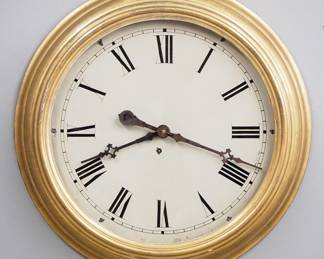 Lot 193: A late 19th century Ingraham Gilded Gallery clock.  8-day time only movement with 18" painted metal dial and Roman numerals.  Molded case with lift door and original Gilded finish.  Interior paper label 80% intact.  Some finish wear, minor dial wear, running when cataloged.  25" diameter.  ESTIMATE $400-600
