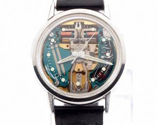 Lot 219:  A vintage Bulova Accutron M4 "Spaceview" model gentleman's wristwatch.  Skeletonized Quartz movement with sweep seconds, Spaceview crystal with round markers, rear set, serial #1-299306.  35 mm Stainless Steel case with an original Black leather "Accutron" band with Stainless Bulova buckle.  Some wear, winds, sets and running when cataloged.  ESTIMATE $300-500
