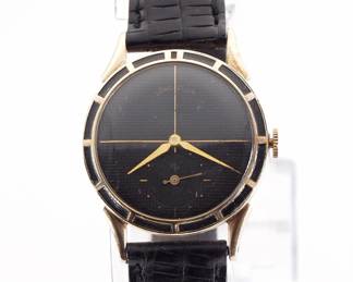 Lot 231:  A vintage Lord Elgin gentleman's wristwatch.  Manual wind, 21j, 680 movement with a Black textured dial, baton bezel markers and subsidiary seconds, serial #K907399.  30 mm GF case with a replaced leather band.  Some wear, winds, sets and running when cataloged.  ESTIMATE $100-200
