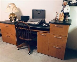 Three-section office desk with file cabinets