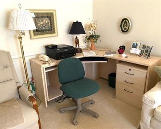 Corner desk with file cabinet, computer chair and printer