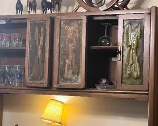 Collection of Bryer Horses displayed on Mid Century Cabinet