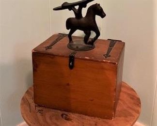 Vintage shoeshine box with cast iron horse and shoe rest