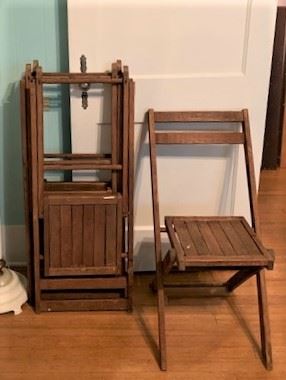 Set of four vintage wooden folding chairs