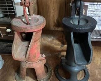 Two of three vintage well hand pumps