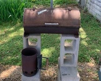 Small, but very heavy, cast-iron smoker/grill