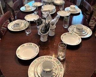 "Christmas Charm" service for 8  with matching glasses, serving dishes, and flatware.