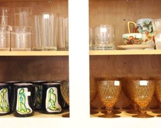 Beautiful amber drinking glasses and Art Rumi mugs.