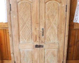 Heavily carved primitive cabinet.                                                
35 1/2" W x 16" D x 59 1/2" H.   BUY IT NOW! $295.00.