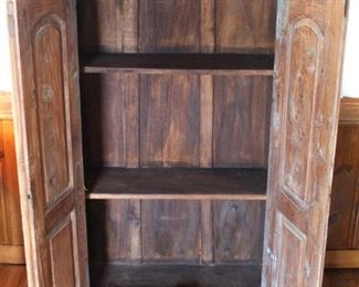 Heavily carved primitive cabinet.                                                 35 1/2" W x 16" D x 59 1/2" H.   BUY IT NOW! $295.00.
