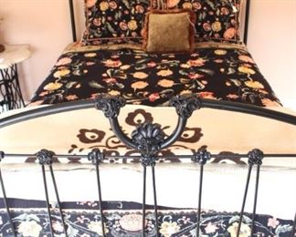 Heavy iron bed full size bed.     54W x 61 1/2H                                           BUY IT NOW!  $250  Price includes bed only not mattress and box springs.