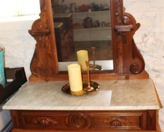 Victorian era dresser with mirror and marble top.   Wonderful drawers pulls.