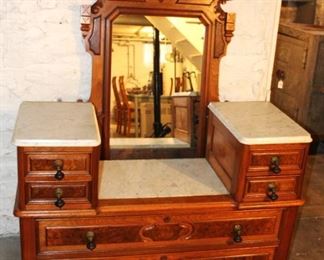 Antique dresser with mirror. $325.00.                                     Base 35 1/2" H x 19" D x 49" W.                                                    Mirror 68" H.