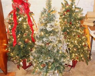 Prelit Christmas trees.  Great sizes.