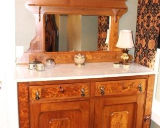 Victorian Era burled walnut mirrored dresser with marble top.  Please note, though you can't see it in this picture, the left door has a split in it.   54W x 22D x93H        Height of base without mirror is 42 inches.  