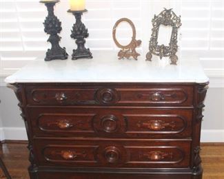 Beautiful marble top walnut dresser/server with hand carved pulls-Gorgeous southern piece.                          
BUY IT NOW!   $575.00.                                                               23 1/2" D x 46 1/2" W x 34" H.             
