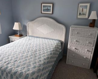 White wicker full size bedroom set. Headboard and frame, no mattress. Dresser and nightstand.