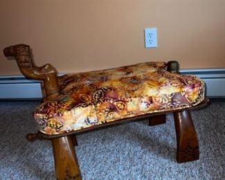Camel saddle ottoman