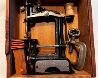 Very rare Smith & Egge mini hand sewing machine in original wooden box with needles, sleeves, instructions