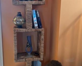 Looks like a cat climbing tower but is a decorative rattan piece.