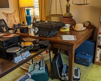 LARGE SQUARE WOOD WORK TABLE...ANTIQUE BALANCE SCALE, VINTAGE TYPEWRITERS, AMERICAN TOURISTER LUGGAGE