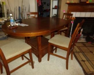 Table and four Matching Chairs - rug to the right