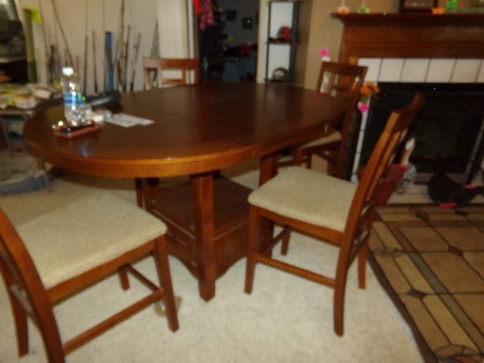 Table and four Matching Chairs - rug to the right