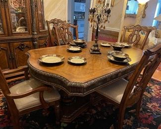 Here is the table with the extensions removed for your smaller gatherings. Charis even have the plastic on them!