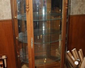 curved-glass curio cabinet