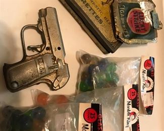 NIP marbles, cap pistol, vintage Camel tin