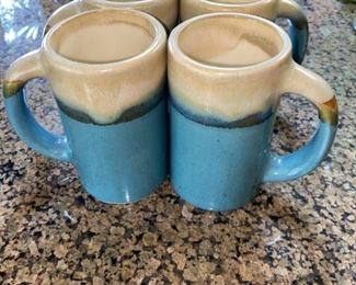 Set of signed coffee mugs