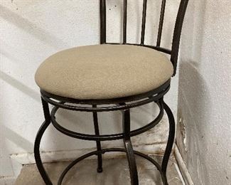 Swivel wrought iron bar-height stool