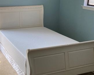 Full size decorative panel bed with nearly new firm foam mattress.