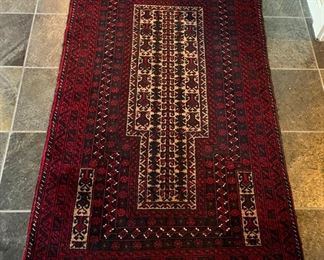 Hand knotted wool on cotton Afghan Balouchi w/damage on corner - 3'x5'