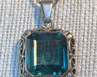 Green Spinel Pendant Encased With 830 Silver