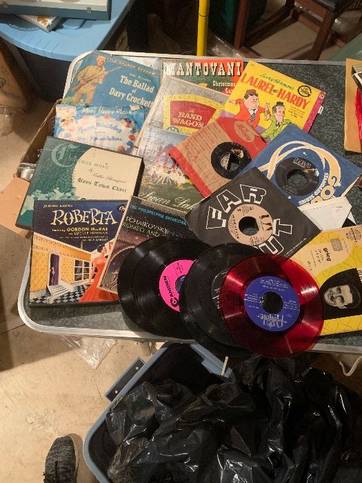 45s including Elvis, Andy Williams, Laurel & Hardy