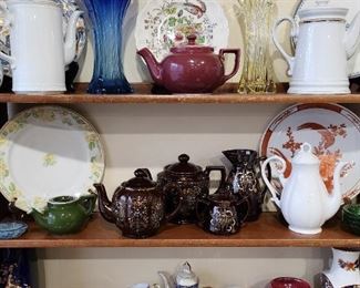 Art glass
Japan tea sets
German tea/coffee pots
Shawnee pottery swan 
Hull pottery
Hall pottery