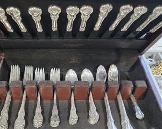 The Masters sterling flatware 
Service for 12