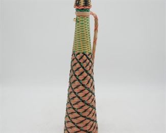 Multicolor Woven Plastic Wrapped Glass Bottle
