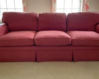 Crate & Barrel Three Seat Sofa Upholstered in Raspberry-Colored Fabric. Measures 84" W x 36" D. Photo 1 of 4.