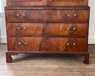 Antique English Flame Mahogany Linen Press with Original Bracket Feet. Measures 48" W x 23" D x 78" H. Photo 5 of 6.