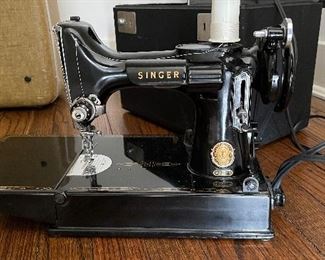 Singer 221- Featherweight Sewing Machine. Photo 1 of 5. 