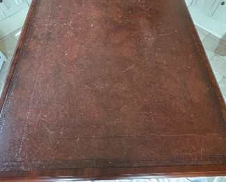 Limited Edition Antique Preproduction of Sir Winston Churchill's Library Partners Writing Desk. Handmade by Arthur Brett & Sons Ltd. Mahogany with Tooled Leather Writing Surface. Measures 66" W x 37.5" D x 29.75" H. Photo 2 of 6.