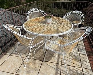White wrought iron patio table