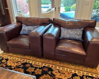 Matching leather sofas and chairs by Van Den Bergh’s South Africa. Leather is Kudu Antelope. Each chair measures 3’3” deep 3’8” wide, 31” tall