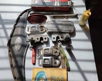 #1504 • GM Seat Belt Buckles, Ford Emblem, NOS Spark Plugs, Bottle Opener and More