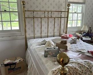 brass bed with porcelain
