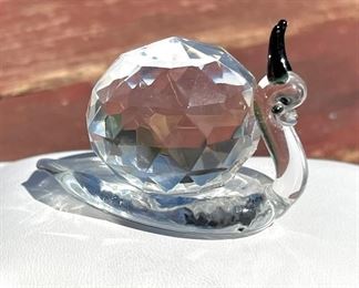 $24. The cutest itty bitty crystal snail. We named him Reggie.