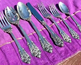 $5500. Elegant Wallace Silversmiths Sterling Silver Grande Baroque 59-Piece Set. Scientifically proven to turn Kraft Mac & Cheese into a gourmet bowl of Macaronis et Fromage. Food just tastes better with this silverware!